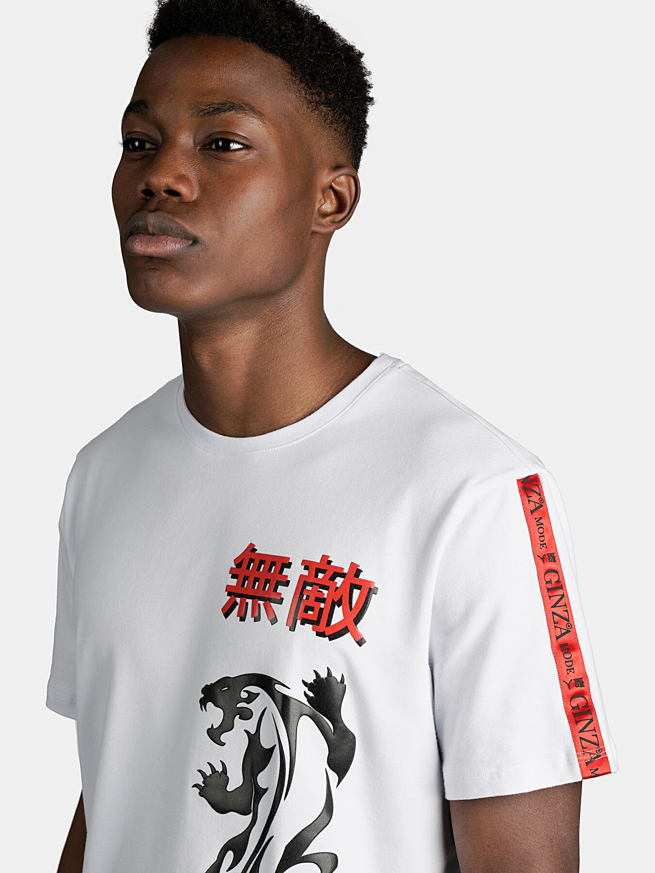 White T-shirt with contrasting prints and logo accents brand