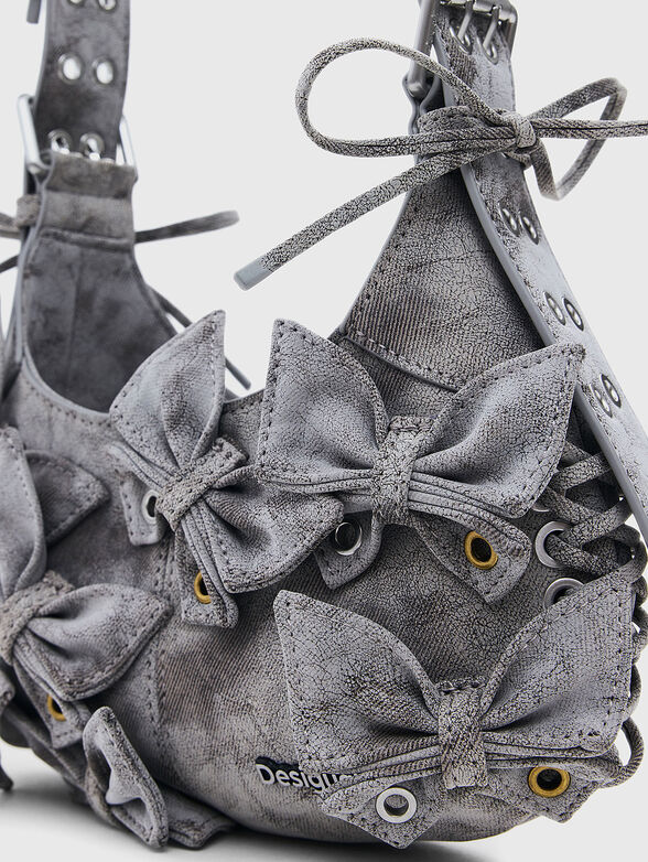 Small bag with eyelets and washed effect - 5