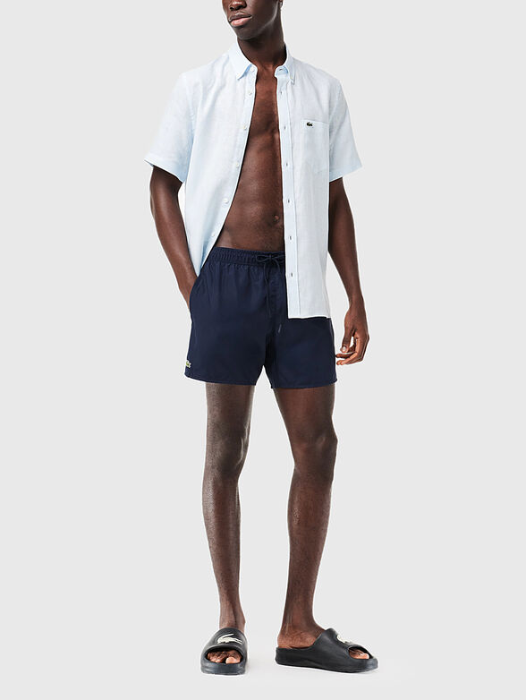 Yellow shorts with logo detail - 4