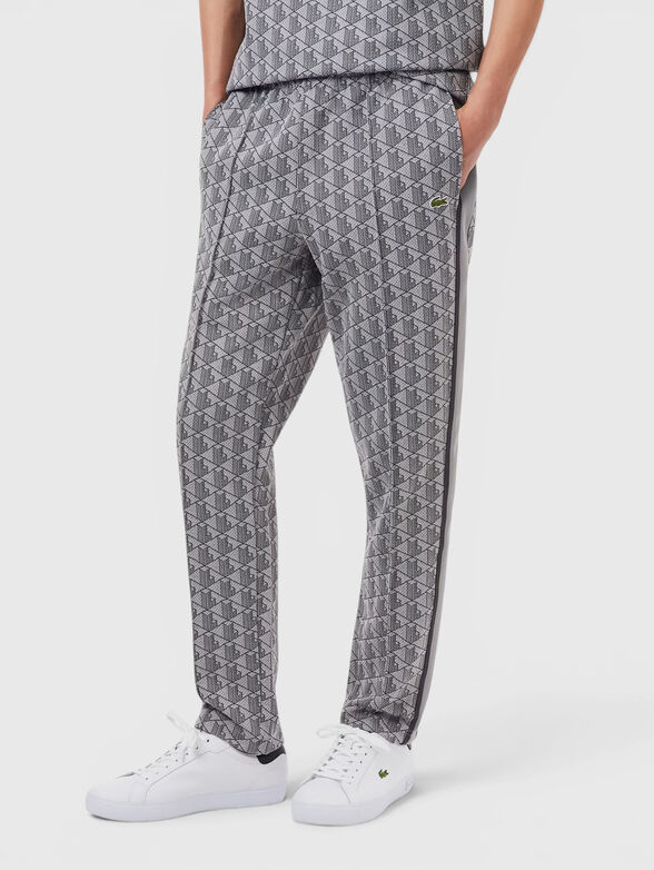 Brown sports trouser with monogram print - 1