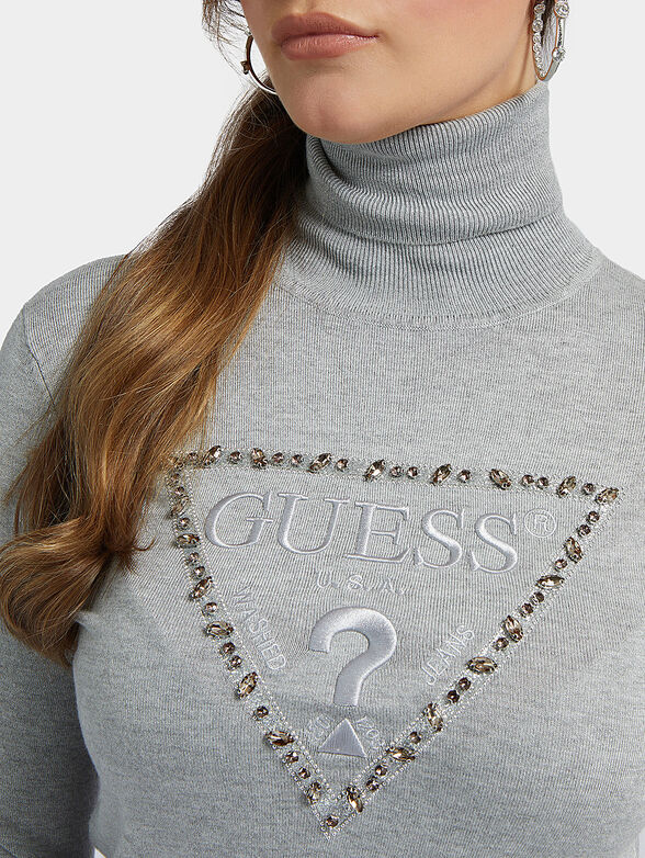 NOEMI black sweater with turtleneck brand GUESS — Globalbrandsstore.com/en