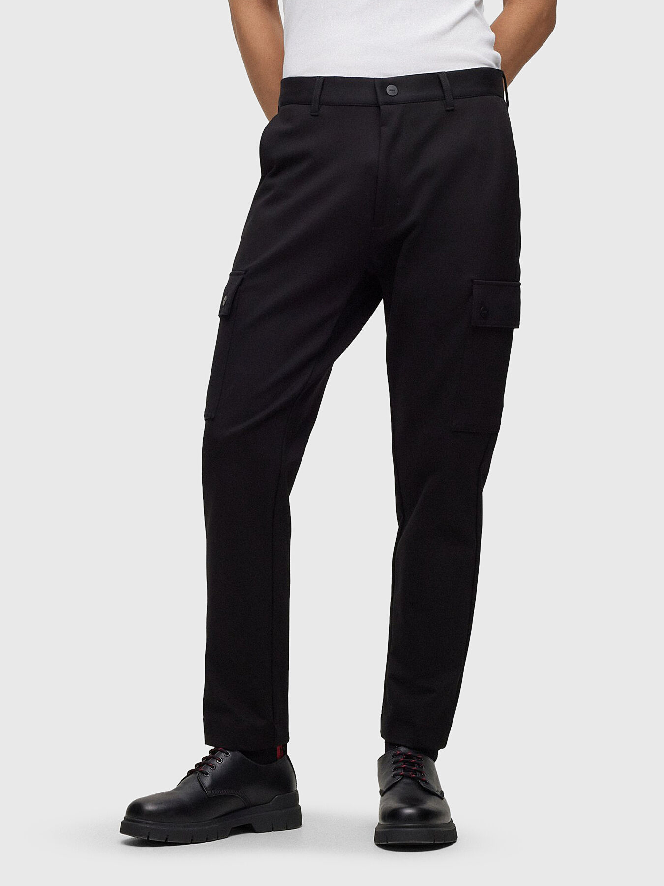 Black trousers with cargo pockets brand HUGO Globalbrandsstore en