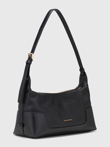 Leather bag with a gold logo - 3