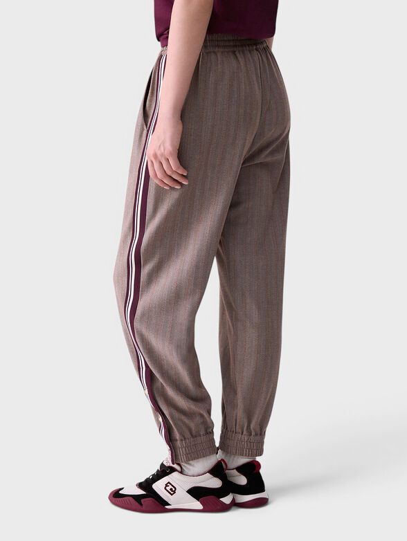 Trousers with side trim and buttons - 2