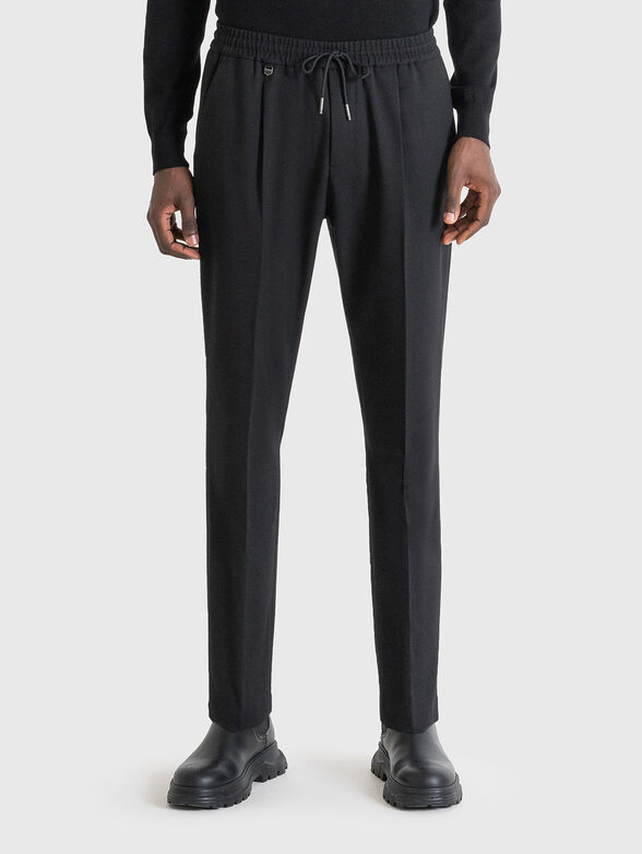 Trousers with elastic waist in black colour - 1