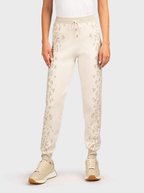 Sports pants with elastic cuffs and animal print - 1