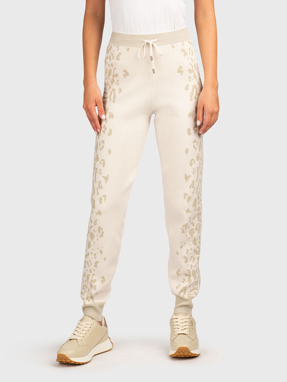 Sports pants with elastic cuffs and animal print - 1