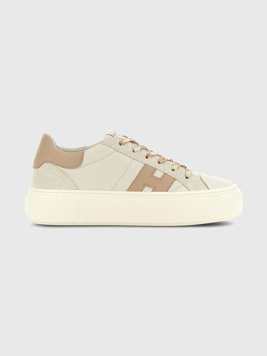 Sneakers with a contrasting logo