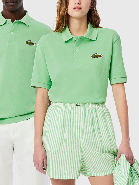 Unisex polo shirt in black - 1