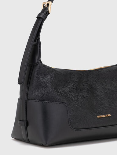 Leather bag with a gold logo - 4