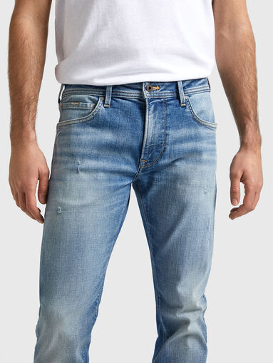 Light blue jeans with accent rips  - 4
