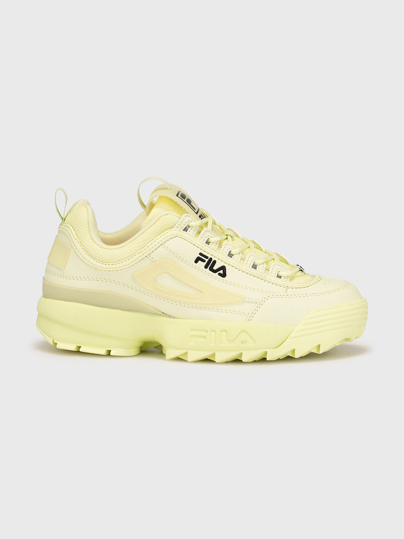 Fila yellow taped logo hot sale disruptor 2 premium trainers