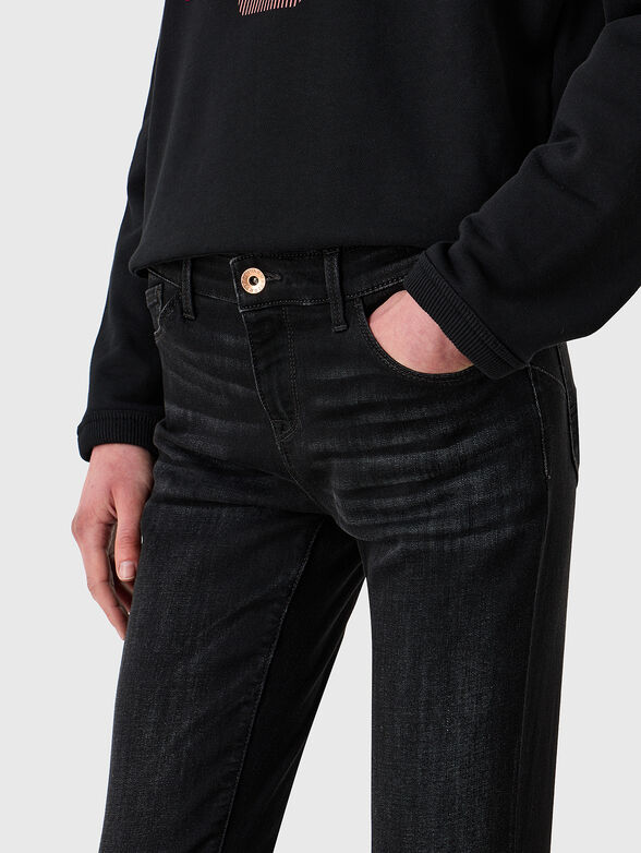 Black jeans with embroidered logo - 5