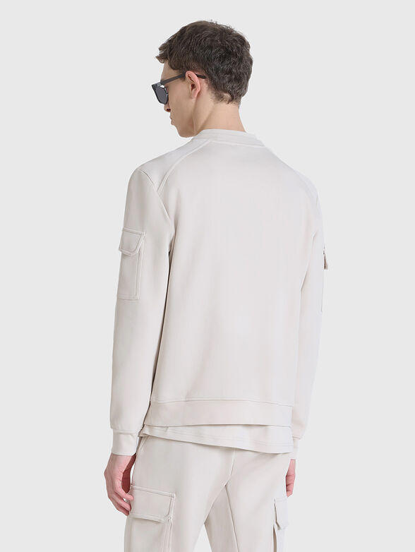 Sweatshirt in black with pockets on the sleeves - 2