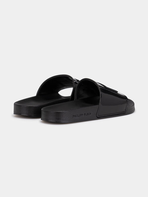 Slides in black with logo detail - 4