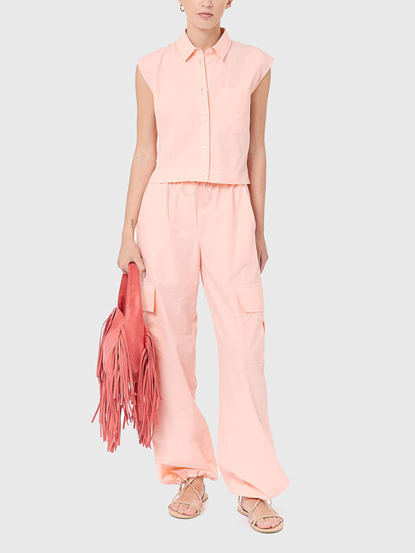Sleeveless shirt in pink - 1