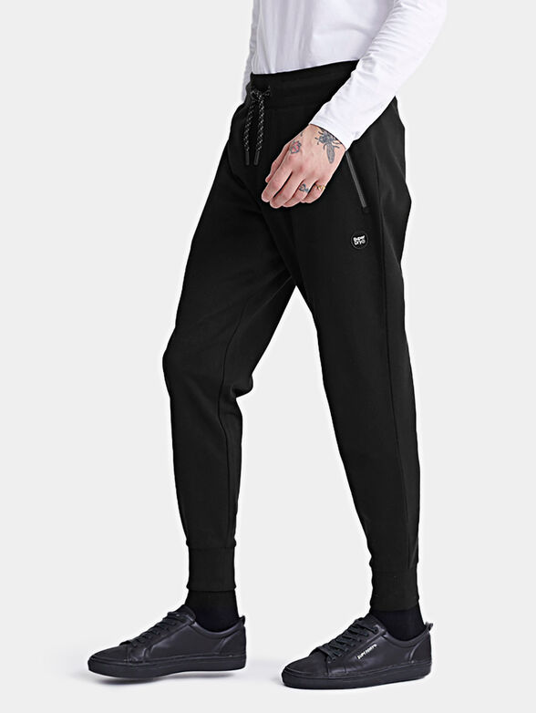 COLLECTIVE Cotton joggers in black - 1