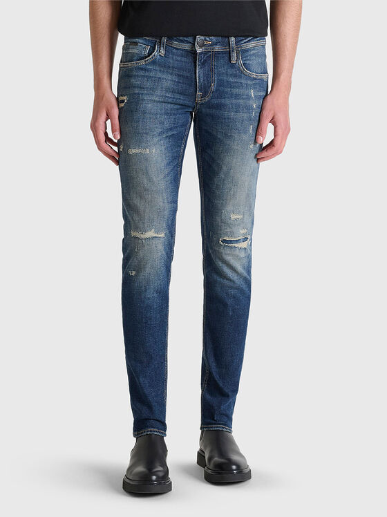 Слим дънки с акцентни накъсвания - 1