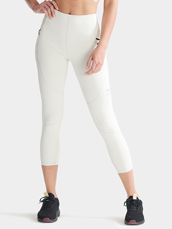 Sports leggings in pale grey color - 1