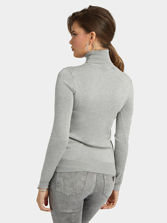 NOEMI black sweater with turtleneck brand GUESS — Globalbrandsstore.com/en