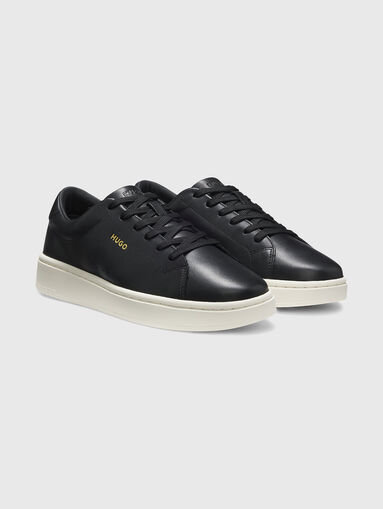 Sneakers with a gold logo  - 3