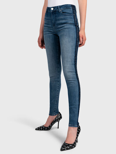 Skinny jeans with branded logo straps - 1