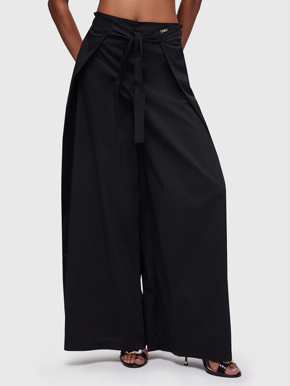 Loose fitting pants with wide legs - 1