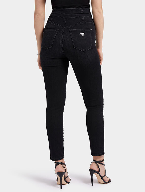 High-waisted black jeans with accent buttons - 2