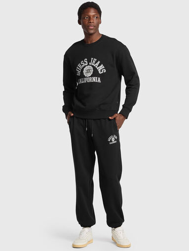 Black sports trousers  with ties at the waist - 5