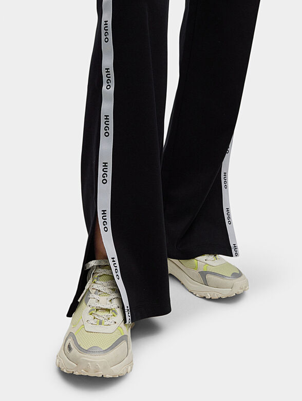 Sports pants with contrasting stripes - 3