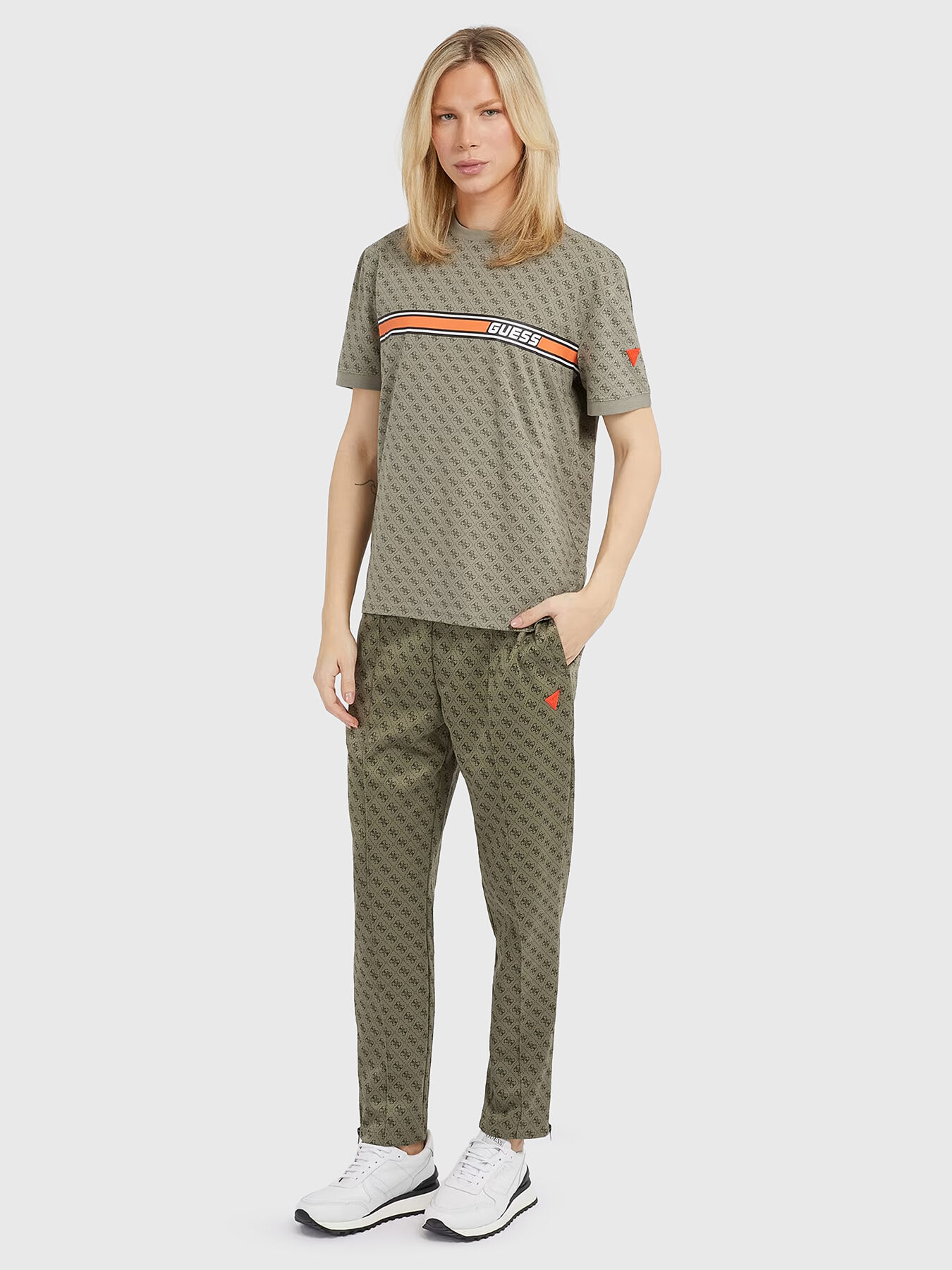 Monogram logo print sweatpants in beige brand GUESS Globalbrandsstore en