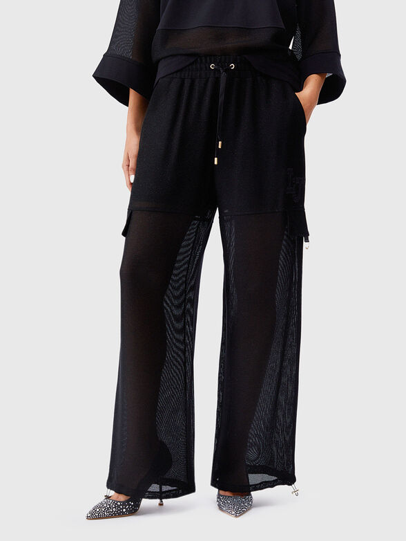 Cargo pants with a mesh texture - 1