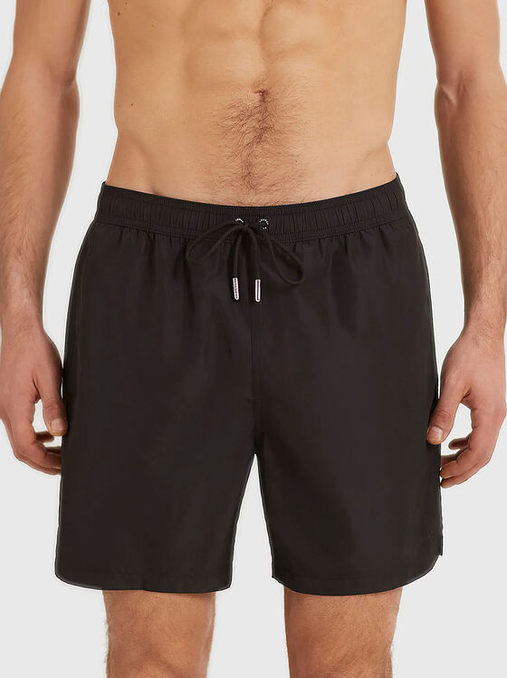 PASSEPARTOUT black beach shorts - 1