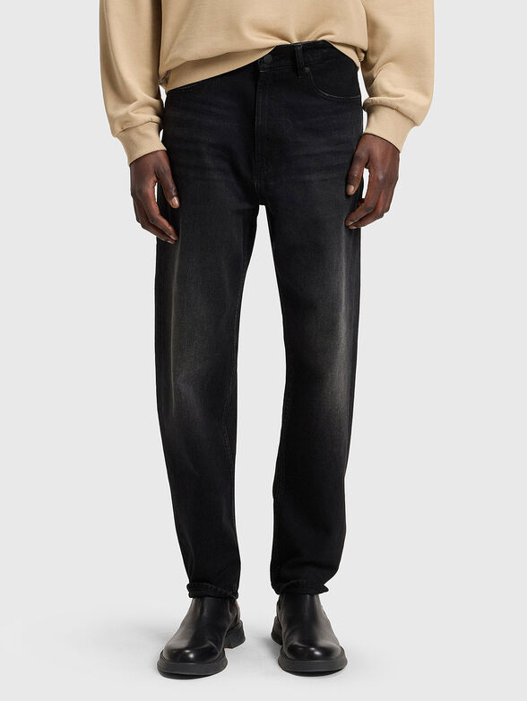 Jeans with washed effect and logo - 1