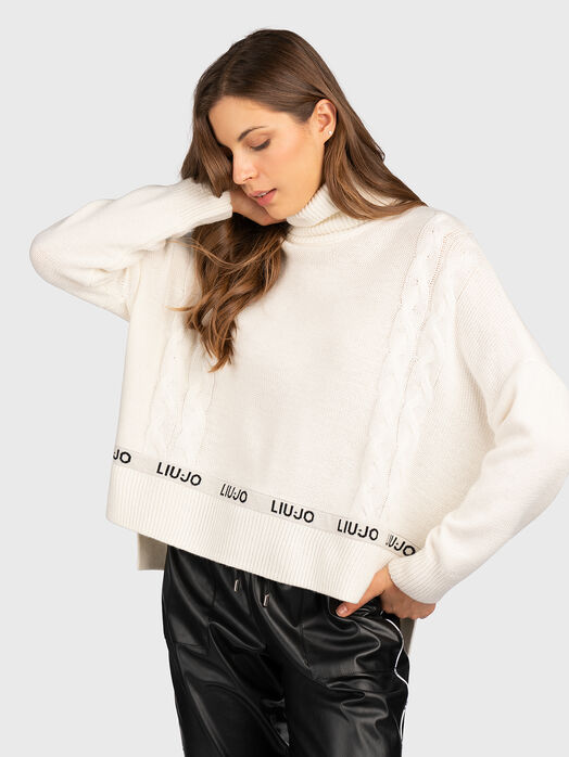 Black sweater with logo details