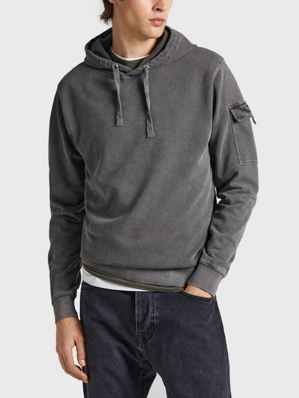 Sweatshirt with hood and accent pocket - 1