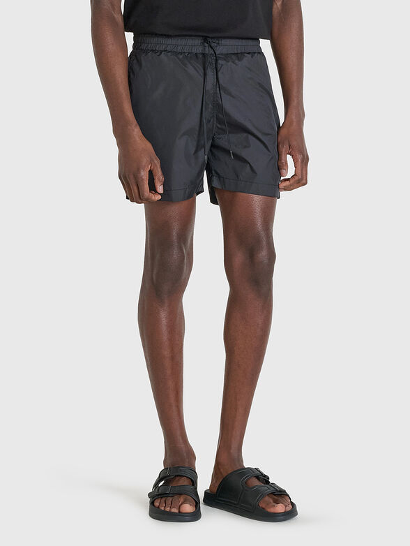 Beach shorts with rubberized logo - 0