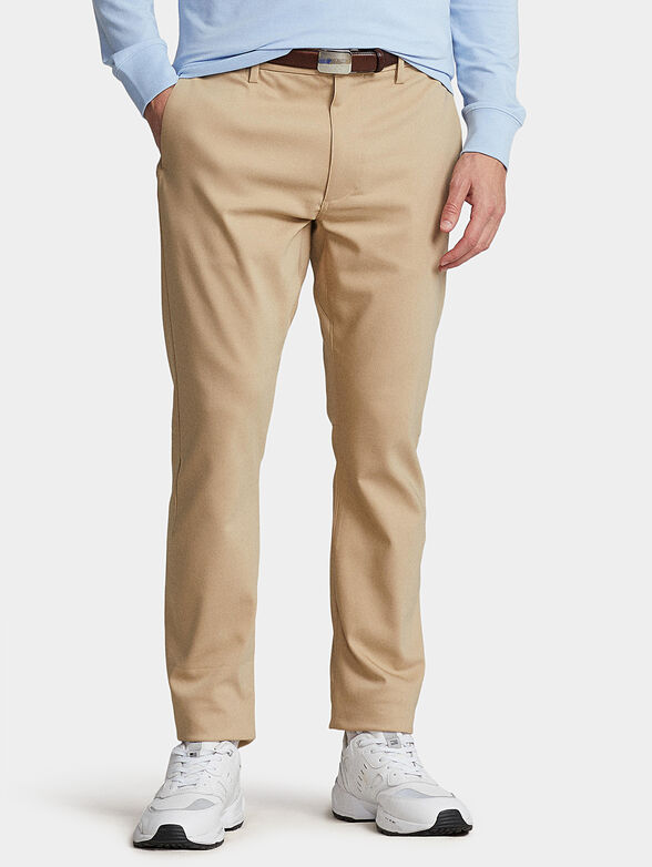 Cotton blend trousers in beige - 1