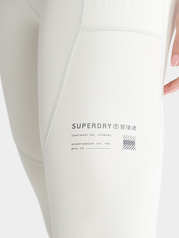 Sports leggings in pale grey color - 6