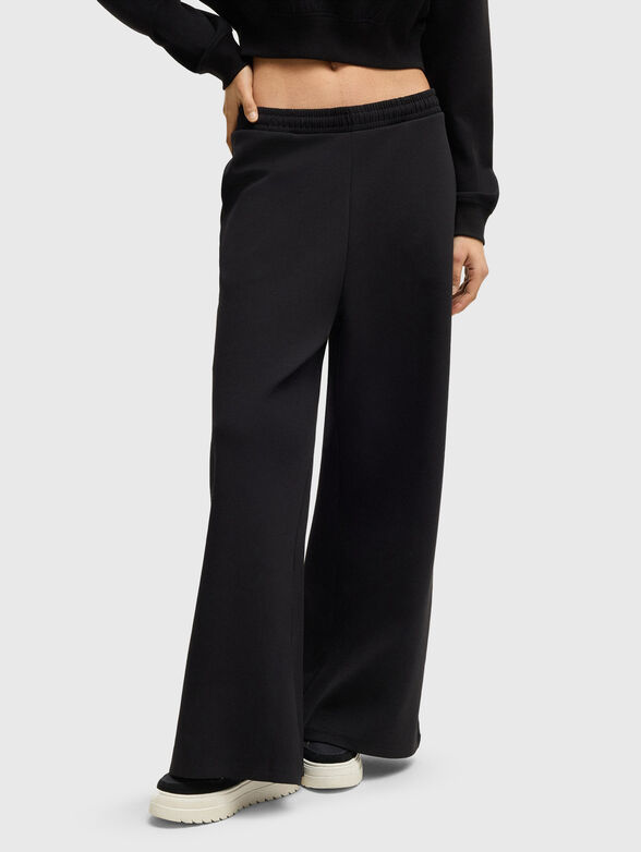 Sports trousers with wide legs - 1