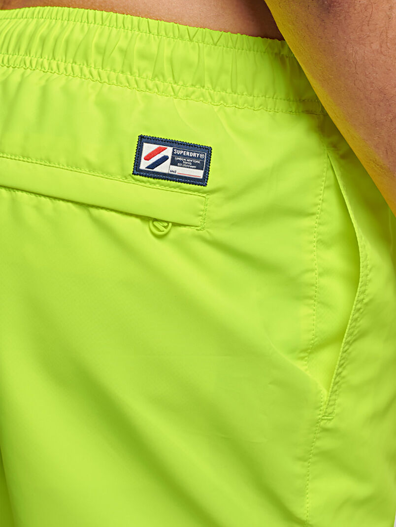 Beach shorts in neon green color - 3