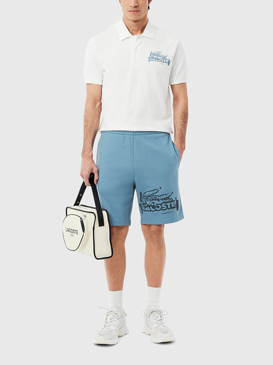 Cotton shorts with logo print in ecru - 1