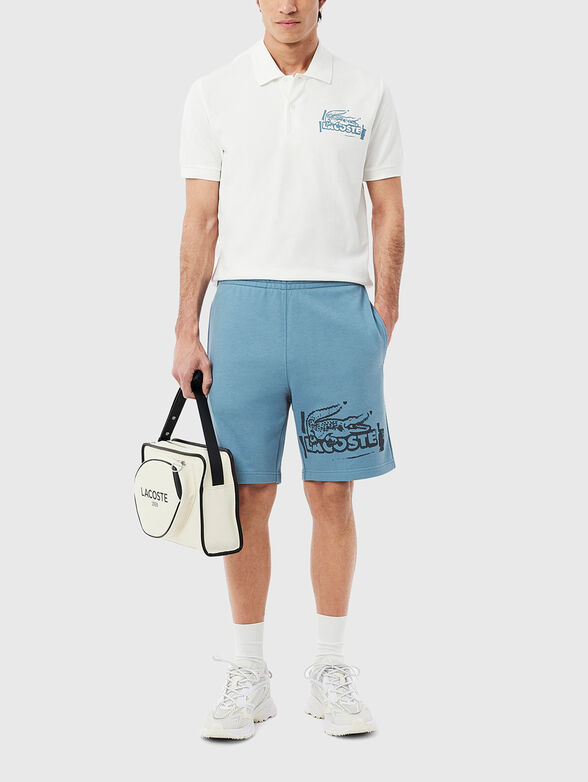 Cotton shorts with logo print in ecru - 1