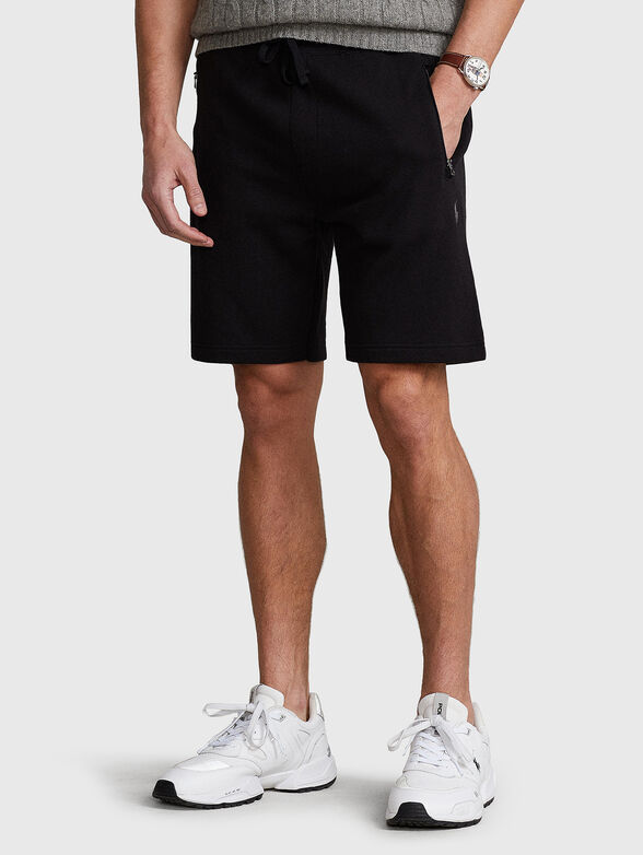 Athletic shorts with zippers - 1