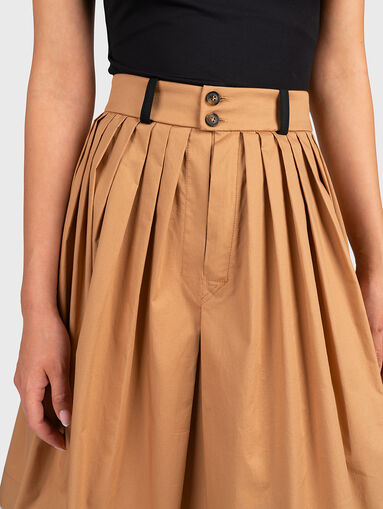 Pleated midi skirt in beige color - 4