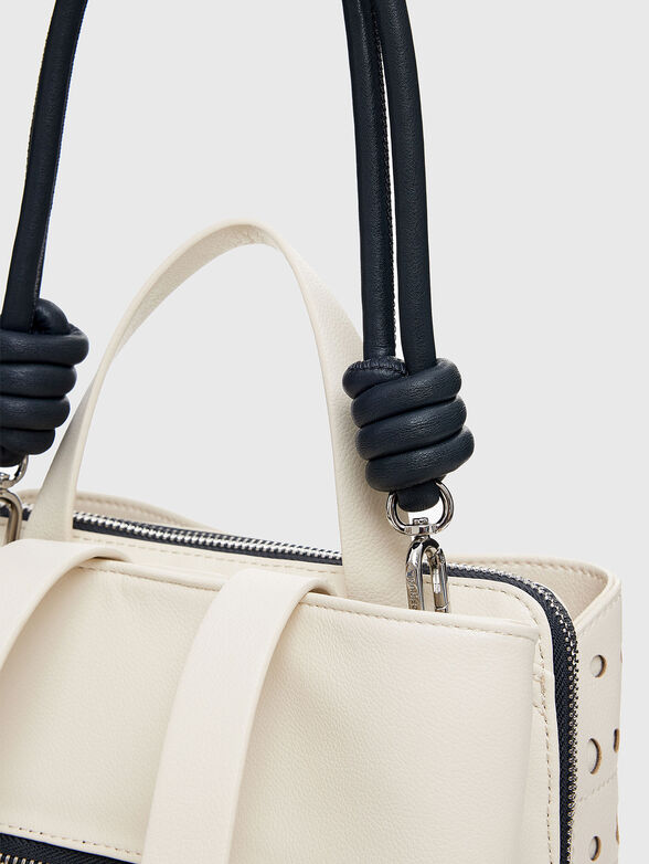 Backpack with perforations in black - 5