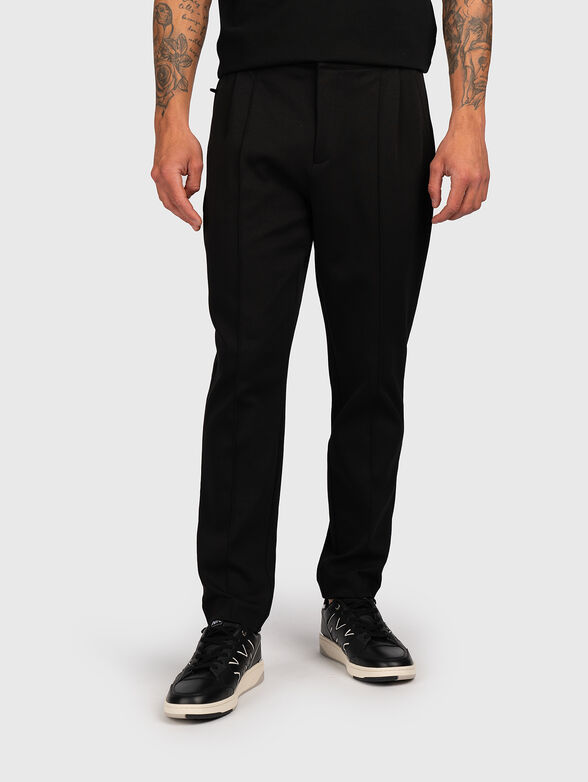 Straight trousers in black - 1