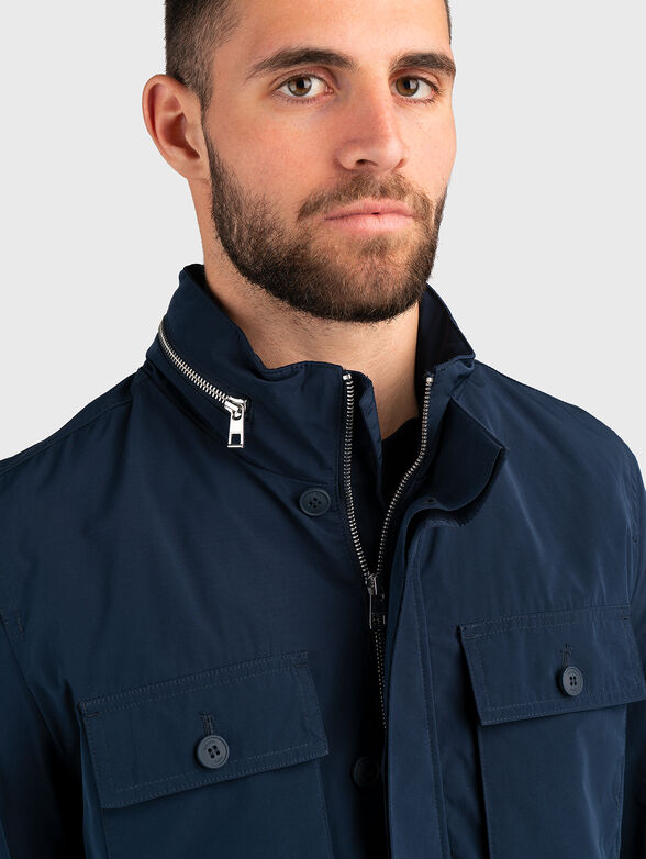 Hooded jacket with accent pockets - 4
