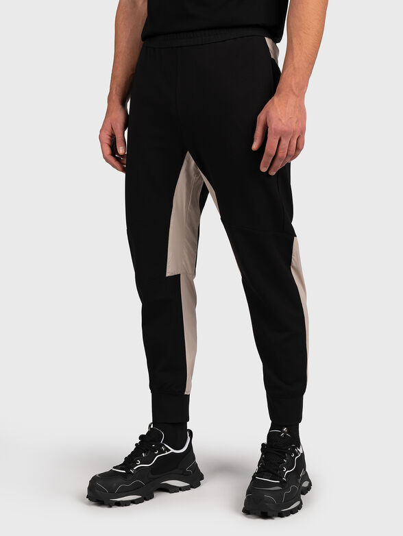 Sports pants with beige inserts - 1