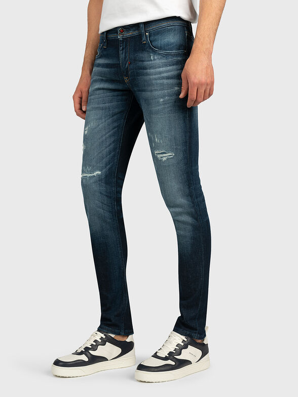 Skinny jeans with abrasions - 1